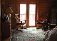 Doors to outside deck from master bedroom